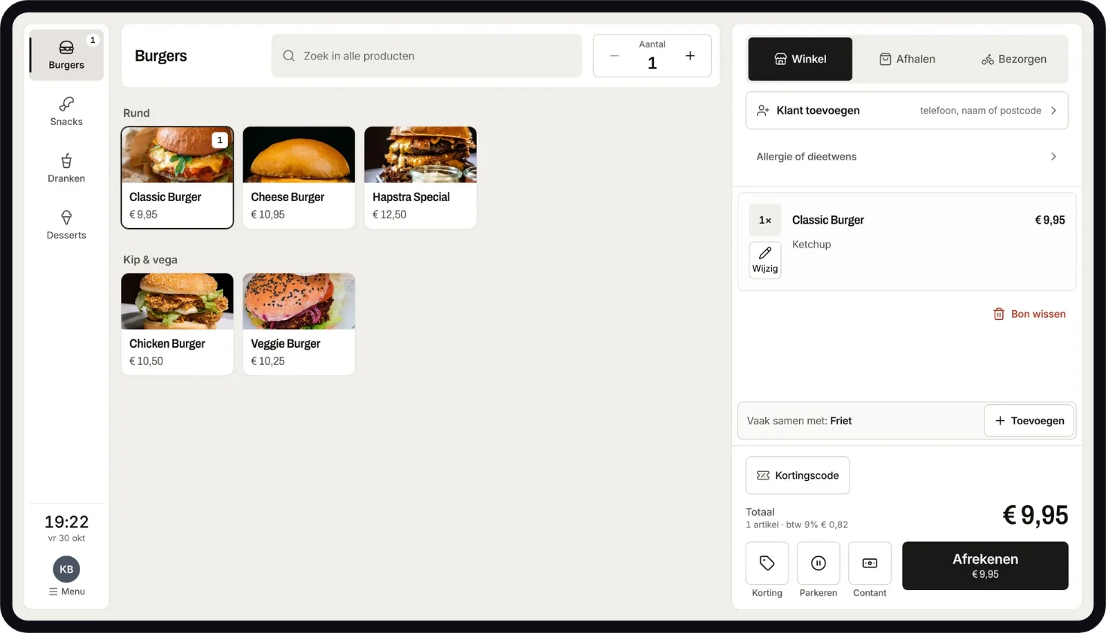 De kassa van ORDEVIX met fototegels van burgers en een bestelling die klaarstaat om af te rekenen